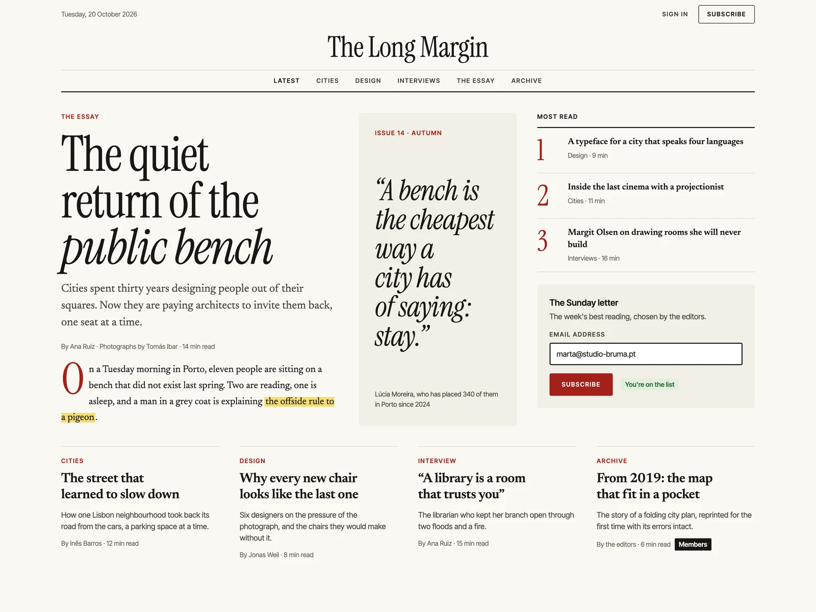 Editorial: a magazine on a screen: serif headlines, long columns, red ink for what matters.